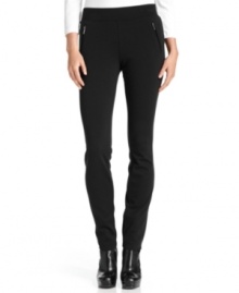 Calvin Klein elevates soft, ponte-knit leggings with zippered pockets and a figure-skimming fit. Calvin Klein elevates soft, ponte-knit leggings with zippered pockets and a figure-skimming fit.