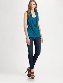 Soft jersey tank layered with a draped cowlneck for a contemporary look that can be dressed up or down. CowlneckSleeveless94% rayon/6% spandexDry cleanMade in USAModel shown is 5'10 (177cm) wearing US size Small. Soft jersey tank layered with a draped cowlneck for a contemporary look that can be dressed up or down. CowlneckSleeveless94% rayon/6% spandexDry cleanMade in USAModel shown is 5'10 (177cm) wearing US size Small.