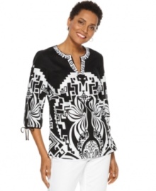 Make a statement in this printed tunic from JM Collection, featuring a bold graphic print and embroidery at the neckline. Make a statement in this printed tunic from JM Collection, featuring a bold graphic print and embroidery at the neckline.