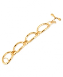 Well-connected. This bracelet from Robert Lee Morris is crafted from gold-tone mixed metal, and features oval links and a toggle closure. Approximate length: 7-1/2 inches. Well-connected. This bracelet from Robert Lee Morris is crafted from gold-tone mixed metal, and features oval links and a toggle closure. Approximate length: 7-1/2 inches.