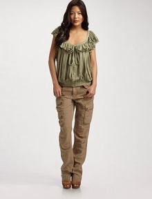 A cascading ruffle neckline lends ultra-feminine appeal to this irresistibly soft jersey design. Round neck Flutter sleeves Tie neckline Button front Banded hem Ruched detail Cotton Dry clean Imported A cascading ruffle neckline lends ultra-feminine appeal to this irresistibly soft jersey design. Round neck Flutter sleeves Tie neckline Button front Banded hem Ruched detail Cotton Dry clean Imported