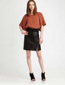 Artfully crafted with front pintucking and a keyhole detail, this billowy, silk-rich top has dolman sleeves and an elasticized back hem. Crewneck with keyhole detailDropped shouldersElbow-length dolman sleevesElastic back hem hits below the hips95% silk/5% spandexDry cleanImportedModel shown is 5'10 (177cm) wearing US size Small. Artfully crafted with front pintucking and a keyhole detail, this billowy, silk-rich top has dolman sleeves and an elasticized back hem. Crewneck with keyhole detailDropped shouldersElbow-length dolman sleevesElastic back hem hits below the hips95% silk/5% spandexDry cleanImportedModel shown is 5'10 (177cm) wearing US size Small.