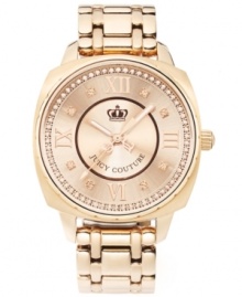 Boisterous glam in a compact design: a stunning timepiece brought to you by Juicy Couture. Beau collection watch by Juicy Couture crafted of rose-gold tone stainless steel bracelet and round case. Rose-gold tone sunray dial crystallized with ring of Swarovski elements features textured inner dial, applied Roman numerals at twelve, three, six and nine o'clock, crystal markers, three hands, text logo and crown logo. Quartz movement. Water resistant to 30 meters. Two-year limited warranty.