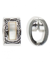 Monet delivers artistic beauty with these classic magnetic clip-on earrings with traditional engraved detail. In silver tone mixed metal and white mother-of-pearl. Approximate diameter: 3/8 inch. Monet delivers artistic beauty with these classic magnetic clip-on earrings with traditional engraved detail. In silver tone mixed metal and white mother-of-pearl. Approximate diameter: 3/8 inch.