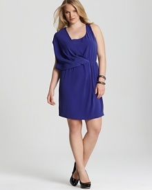 Fluid draping lends ethereal elegance to this DKNYC Plus dress, while a jewel-toned hue elevates the style to head-turning status. Fluid draping lends ethereal elegance to this DKNYC Plus dress, while a jewel-toned hue elevates the style to head-turning status.