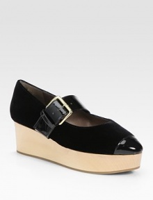 A chunky wooden wedge is the foundation of this tailored design, combining lush velvet with patent leather accents. Wooden wedge, 2¼ (60mm)Wooden platform, 1 (25mm)Compares to a 1¼ heel (30mm)Velvet and patent leather upperAdjustable patent leather ankle strapLeather liningRubber solePadded insoleMade in Italy A chunky wooden wedge is the foundation of this tailored design, combining lush velvet with patent leather accents. Wooden wedge, 2¼ (60mm)Wooden platform, 1 (25mm)Compares to a 1¼ heel (30mm)Velvet and patent leather upperAdjustable patent leather ankle strapLeather liningRubber solePadded insoleMade in Italy