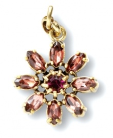 Flower power. A decorative daisy adorns this pretty pendant from Fossil. Featuring a rich purple hue and glass accents with a pronged design, it's crafted in brass tone mixed metal. Approximate drop: 3/4 inch. Flower power. A decorative daisy adorns this pretty pendant from Fossil. Featuring a rich purple hue and glass accents with a pronged design, it's crafted in brass tone mixed metal. Approximate drop: 3/4 inch.