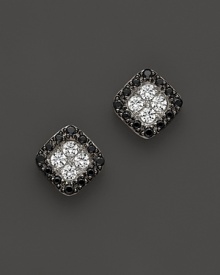 Black and white diamonds in 14K. white gold settings. Black and white diamonds in 14K. white gold settings.