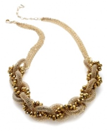 Wrap your neckline in bohemian beauty. This Alfani necklace features a twisted silhouette with 12k gold-plated mixed metal mesh and faceted beads. Approximate length: 18 inches + 3-inch extender. Wrap your neckline in bohemian beauty. This Alfani necklace features a twisted silhouette with 12k gold-plated mixed metal mesh and faceted beads. Approximate length: 18 inches + 3-inch extender.
