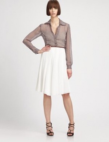 A semi-sheer graphic print made of smooth Italian silk with retro appeal. Wing collarV-neck with button-down frontDropped shouldersLong sleeves with button cuffsHigh-low hemAbout 26 from shoulder to hemSilkDry cleanImported of Italian fabricModel shown is 5'10.5 (179cm) wearing US size 4. A semi-sheer graphic print made of smooth Italian silk with retro appeal. Wing collarV-neck with button-down frontDropped shouldersLong sleeves with button cuffsHigh-low hemAbout 26 from shoulder to hemSilkDry cleanImported of Italian fabricModel shown is 5'10.5 (179cm) wearing US size 4.