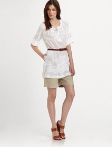 A romantic cotton top featuring a relaxed fit and lovely embellishments for a universally flattering look.Self-tie detail at ruched necklineRoll-tab sleevesLovely embellished detailsPull-on styleAbout 32 from shoulder to hemCottonDry cleanImported Model shown is 5'10 (177cm) wearing US size Small. A romantic cotton top featuring a relaxed fit and lovely embellishments for a universally flattering look.Self-tie detail at ruched necklineRoll-tab sleevesLovely embellished detailsPull-on styleAbout 32 from shoulder to hemCottonDry cleanImported Model shown is 5'10 (177cm) wearing US size Small.