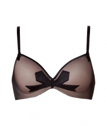 Stylish underwire bra in fine nylon stretch blend - Elegant in classic black and nude from French lingerie maven Chantal Thomass - Tulle overlay and ultra-feminine bow detail - 3/4 cups offer nearly full coverage - Slim straps and satin trim - Creates a flattering silhouette, a perfect mix of sweet and sexy - Wear under just about anything Stylish underwire bra in fine nylon stretch blend - Elegant in classic black and nude from French lingerie maven Chantal Thomass - Tulle overlay and ultra-feminine bow detail - 3/4 cups offer nearly full coverage - Slim straps and satin trim - Creates a flattering silhouette, a perfect mix of sweet and sexy - Wear under just about anything