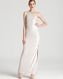 Sleek and statuesque, Laundry by Shelli Segal's impossibly glamorous gown stops the show in a one shouldered silhouette. Sleek and statuesque, Laundry by Shelli Segal's impossibly glamorous gown stops the show in a one shouldered silhouette.