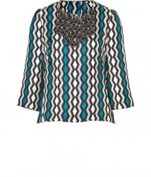 Cause a stylish commotion in this retro-inspired printed and embellished silk top from Milly - Round neckline with crystal and charm bib embellishment, gathering at shoulders, long flared sleeves, exposed back zip closure, all-over print - A-line silhouette - Wear with cropped trousers, high-heel oxfords, and a statement satchel Cause a stylish commotion in this retro-inspired printed and embellished silk top from Milly - Round neckline with crystal and charm bib embellishment, gathering at shoulders, long flared sleeves, exposed back zip closure, all-over print - A-line silhouette - Wear with cropped trousers, high-heel oxfords, and a statement satchel