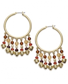 Colorful beads fashioned from glass, resin and wood create head-turning style on these Lauren Ralph Lauren hoop earrings. Set in 14k gold-plated mixed metal. Approximate drop: 2-1/4 inches. Colorful beads fashioned from glass, resin and wood create head-turning style on these Lauren Ralph Lauren hoop earrings. Set in 14k gold-plated mixed metal. Approximate drop: 2-1/4 inches.