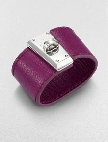 A wide cuff of rich pebble-textured leather is boldly fastened with a polished turn-lock clasp in this simple yet striking design.LeatherRhodium and palladium finishLength, about 8.25Width, about 1.5Turn-lock claspImported A wide cuff of rich pebble-textured leather is boldly fastened with a polished turn-lock clasp in this simple yet striking design.LeatherRhodium and palladium finishLength, about 8.25Width, about 1.5Turn-lock claspImported
