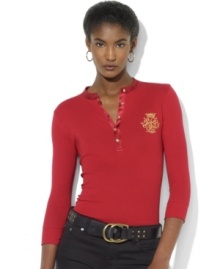 Lauren Ralph Lauren's henley silhouette rendered in soft cotton features charmeuse trim at the neckline and a beaded embroidered LRL crest for glamorous updates to a classic style. Lauren Ralph Lauren's henley silhouette rendered in soft cotton features charmeuse trim at the neckline and a beaded embroidered LRL crest for glamorous updates to a classic style.