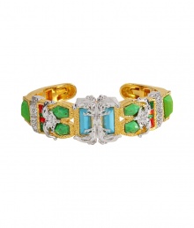 Baroque stylings and Native American influences inform the modern design of this elegant bracelet form Alexis Bittar - Slim cuff style, fashioned from gold- and silver-plated metal, multicolor synthetic gems and imitation turquoise - Pave-set Swarovski crystal embellishment - Made in the USA Baroque stylings and Native American influences inform the modern design of this elegant bracelet form Alexis Bittar - Slim cuff style, fashioned from gold- and silver-plated metal, multicolor synthetic gems and imitation turquoise - Pave-set Swarovski crystal embellishment - Made in the USA
