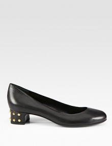 Low-cut leather silhouette with a studded heel. Leather and metal studded heel, 1¼ (30mm)Leather upperLeather lining and solePadded insoleMade in ItalyOUR FIT MODEL RECOMMENDS ordering true size. Low-cut leather silhouette with a studded heel. Leather and metal studded heel, 1¼ (30mm)Leather upperLeather lining and solePadded insoleMade in ItalyOUR FIT MODEL RECOMMENDS ordering true size.
