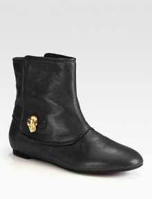 A gleaming goldtone skull adds signature style to this ultra-soft leather ankle boot. Leather upperPull-on styleLeather lining and solePadded insoleMade in Italy A gleaming goldtone skull adds signature style to this ultra-soft leather ankle boot. Leather upperPull-on styleLeather lining and solePadded insoleMade in Italy