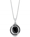 Adorn your neckline with sweet, swirling sparkle. This oval-shaped pendant highlights an onyx gemstone at center (8 mm x 10 mm) with surrounding rows of round-cut white diamonds (1/2 ct. t.w.) and black diamond accents. Set in sterling silver. Approximate length: 18 inches. Approximate drop: 1 inch.