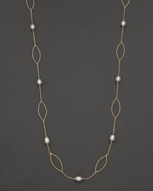 Freshwater pearls add rich luster to links of 14K yellow gold. By Nancy B. Freshwater pearls add rich luster to links of 14K yellow gold. By Nancy B.