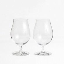 Spiegelau, the world's oldest glass manufacturer, brings you the Beer Classics Collection to enhance the pleasure of drinking fine beers. Crafted of lead-free crystal, a unique platinum finishing process increases durability and adds a brilliant shine. Stemmed Pilsner Glass features a 15-ounce tulip-shaped bowl on a short footed stem, an elegant design that also allows for an intense release of flavors. Perfect for serving a standard 12-ounce bottle of beer with ample room for the formation of the frothy head. Packaged as a set of 2 in an attractive gift box.