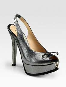 Timeless platform silhouette with a signature logoed insert and elastic slingback strap. Self-covered heel, 5 (125mm)Covered platform, 1 (25mm)Compares to 4 heel (100mm)Metallic fabric upperPeep toeLeather lining and solePadded insoleMade in Italy Timeless platform silhouette with a signature logoed insert and elastic slingback strap. Self-covered heel, 5 (125mm)Covered platform, 1 (25mm)Compares to 4 heel (100mm)Metallic fabric upperPeep toeLeather lining and solePadded insoleMade in Italy