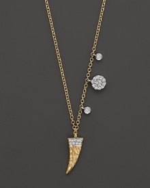 A diamond-embellished horn pendant necklace in yellow gold from Meira T. A diamond-embellished horn pendant necklace in yellow gold from Meira T.
