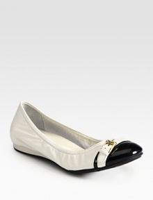 Lustrous leather style with a subtle buckle detail and patent leather toecap. Leather upperLeather liningRubber solePadded insoleImportedOUR FIT MODEL RECOMMENDS ordering true size. Lustrous leather style with a subtle buckle detail and patent leather toecap. Leather upperLeather liningRubber solePadded insoleImportedOUR FIT MODEL RECOMMENDS ordering true size.