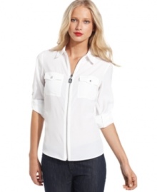 A classic piece gets a decidedly fresh look, from MICHAEL Michael Kors. This shirt features military-inspired details like a metal pull and zip-up front for an appealing edge! A classic piece gets a decidedly fresh look, from MICHAEL Michael Kors. This shirt features military-inspired details like a metal pull and zip-up front for an appealing edge!