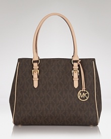 The latest must-have tote from MICHAEL Michael Kors, featuring a go-with-everything (and hold-it-all) design. It is definitely a piece that will stand the test of time. The latest must-have tote from MICHAEL Michael Kors, featuring a go-with-everything (and hold-it-all) design. It is definitely a piece that will stand the test of time.