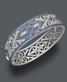 Love is all around us. Share the gift with this stunning, sparkling bangle with intricate heart detailing. Crafted in sterling silver with round-cut sapphires (3-3/4 ct. t.w.) and diamonds (1/4 ct. t.w.). Approximate diameter: 2-1/2 inches. Love is all around us. Share the gift with this stunning, sparkling bangle with intricate heart detailing. Crafted in sterling silver with round-cut sapphires (3-3/4 ct. t.w.) and diamonds (1/4 ct. t.w.). Approximate diameter: 2-1/2 inches.