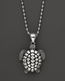 A playful sea turtle dangles from a sterling silver ball chain on this everyday necklace from Lagos. A playful sea turtle dangles from a sterling silver ball chain on this everyday necklace from Lagos.