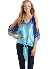 THE LOOKMixed printV-neckCutout shouldersThree-quarter length dolman sleeves with banded cuffsTie-front waistIncludes solid hued camisoleTHE FITAbout 24 from shoulder to hemTHE MATERIALSilkContrast: rayonCARE & ORIGINDry cleanMade in USAModel shown is 5'8 (172½cm) wearing US size Small. THE LOOKMixed printV-neckCutout shouldersThree-quarter length dolman sleeves with banded cuffsTie-front waistIncludes solid hued camisoleTHE FITAbout 24 from shoulder to hemTHE MATERIALSilkContrast: rayonCARE & ORIGINDry cleanMade in USAModel shown is 5'8 (172½cm) wearing US size Small.