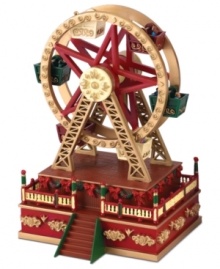 Join the merriment of the Mini Carnival, brought to you by Mr. Christmas. An animated ferris wheel filled will holiday revelers tops a wind-up music box playing a favorite Christmastime tune.