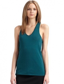 A luxurious layering piece tailored from virgin wool, cut in a versatile tank shape.V-neck Sleeveless Racerback About 28 from shoulder to hem Virgin wool Dry clean Made in Italy A luxurious layering piece tailored from virgin wool, cut in a versatile tank shape.V-neck Sleeveless Racerback About 28 from shoulder to hem Virgin wool Dry clean Made in Italy