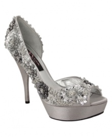 Sparkle alert! With so many beads and sequins, the Sadi evening pumps by Nina will be the centerpiece of the party. Wallflowers need not apply. Sparkle alert! With so many beads and sequins, the Sadi evening pumps by Nina will be the centerpiece of the party. Wallflowers need not apply.