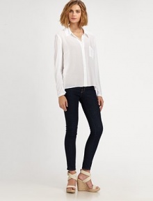 Semi-sheer classic boasts a single patch pocket and hi-low hem. Point collarButton frontSingle patch pocketLong sleevesHi-low hemRayonMachine washMade in USA