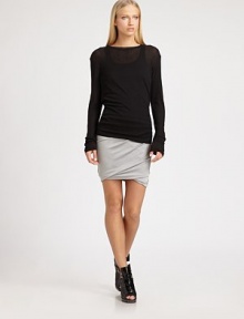 Whisper-soft modal and wool tee with subtle ribbing and dropped shoulders. BoatneckDropped shouldersLong sleevesLonger length hits below hipsModal/woolDry cleanImportedSIZE & FITModel shown is 5'10 (177cm) wearing US size Small. Whisper-soft modal and wool tee with subtle ribbing and dropped shoulders. BoatneckDropped shouldersLong sleevesLonger length hits below hipsModal/woolDry cleanImportedSIZE & FITModel shown is 5'10 (177cm) wearing US size Small.