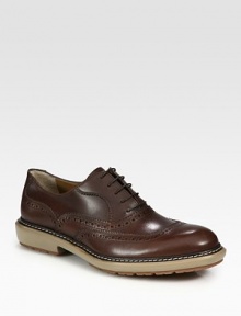 A weekend classic in burnished Italian calfskin, detailed with oxford perforations and a rugged lug sole.Leather liningPadded insoleRubber soleMade in Italy A weekend classic in burnished Italian calfskin, detailed with oxford perforations and a rugged lug sole.Leather liningPadded insoleRubber soleMade in Italy