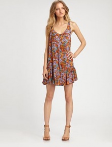 Floral-print favorite has a low scoopneck, hi-low ruffle hem and head-turning scoopback. ScoopneckSleevelessHi-low ruffle hemScoopbackAbout 18 from natural waist53% viscose/47% rayonDry cleanImportedModel shown is 5'10 (177cm) wearing US size Small. Floral-print favorite has a low scoopneck, hi-low ruffle hem and head-turning scoopback. ScoopneckSleevelessHi-low ruffle hemScoopbackAbout 18 from natural waist53% viscose/47% rayonDry cleanImportedModel shown is 5'10 (177cm) wearing US size Small.