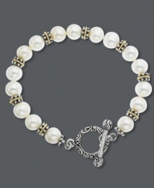 Diversify your style. This versatile bracelet features cultured freshwater pearls (8 mm) intersected by 14k gold beads and a trendy sterling silver toggle clasp. Approximate diameter: 3-3/4 inches. Approximate length: 7-1/2 inches. Diversify your style. This versatile bracelet features cultured freshwater pearls (8 mm) intersected by 14k gold beads and a trendy sterling silver toggle clasp. Approximate diameter: 3-3/4 inches. Approximate length: 7-1/2 inches.