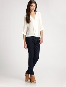 Fine, lustrous silk, tailored in a billowing silhouette with elegant pleats down the front.Stand collar V neckline Blouson sleeves with cuffs Gathered hem Silk; dry clean Imported Fine, lustrous silk, tailored in a billowing silhouette with elegant pleats down the front.Stand collar V neckline Blouson sleeves with cuffs Gathered hem Silk; dry clean Imported