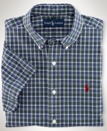 Cut for a relaxed, classic fit, a short-sleeved sport shirt is crafted from crisp cotton poplin in traditional tartan plaid for an authentic look. Cut for a relaxed, classic fit, a short-sleeved sport shirt is crafted from crisp cotton poplin in traditional tartan plaid for an authentic look.