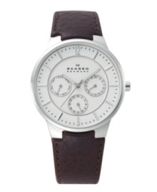 Clean styling makes for an uncomplicated masterpiece. Watch by Skagen Denmark crafted of brown pebbled leather strap and round stainless steel case. White dial features silver tone numerals at twelve and six o'clock, stick indices, black minute track, three multifunctional subdials, luminous hands and logo. Quartz movement. Water resistant to 30 meters. Limited lifetime warranty. Clean styling makes for an uncomplicated masterpiece. Watch by Skagen Denmark crafted of brown pebbled leather strap and round stainless steel case. White dial features silver tone numerals at twelve and six o'clock, stick indices, black minute track, three multifunctional subdials, luminous hands and logo. Quartz movement. Water resistant to 30 meters. Limited lifetime warranty.