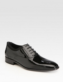 The classic lace-up crafted from sleek patent leather and rich grosgrain trim.Patent leather upperLeather liningPadded insoleLeather soleMade in Italy The classic lace-up crafted from sleek patent leather and rich grosgrain trim.Patent leather upperLeather liningPadded insoleLeather soleMade in Italy