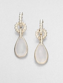 From the Bedeg Collection. A graceful teardrop of faceted milky quartz brings a creamy luster to a richly beaded loop setting of sterling silver.Milky quartzSterling silverDrop, about 1.8Width, about .5Post backMade in Bali