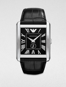 A classic timepiece in sleek stainless steel and luxurious crocodile embossed leather. Quartz movementWater resistant to 5 ATMRectangular stainless steel case, 34.5mm (1.3) X 36.5mm (1.4)Smooth bezelBlack dialRoman numeral hour markersSecond hand sub-dialBlack crocodile embossed leather strapImported A classic timepiece in sleek stainless steel and luxurious crocodile embossed leather. Quartz movementWater resistant to 5 ATMRectangular stainless steel case, 34.5mm (1.3) X 36.5mm (1.4)Smooth bezelBlack dialRoman numeral hour markersSecond hand sub-dialBlack crocodile embossed leather strapImported