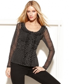 Polka dots, alluringly sheer fabric and feminine ruffles give INC's top a fresh, fashionable look! Polka dots, alluringly sheer fabric and feminine ruffles give INC's top a fresh, fashionable look!